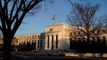 Fed maintains current interest rates, citing inflation concerns and a strong job market