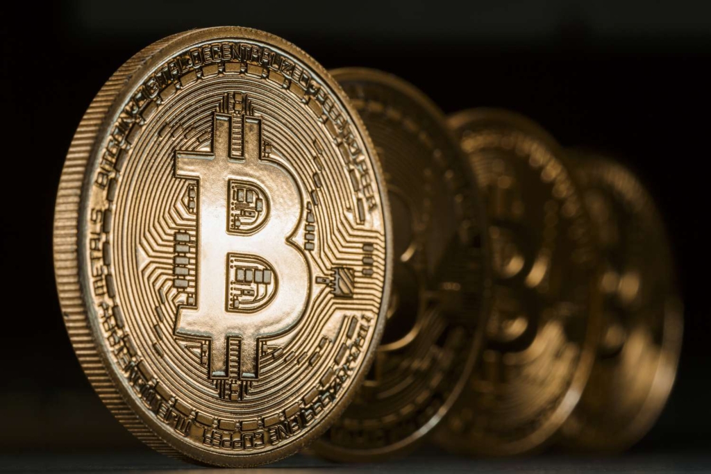 Bitcoin surges almost 6% to above $61,000